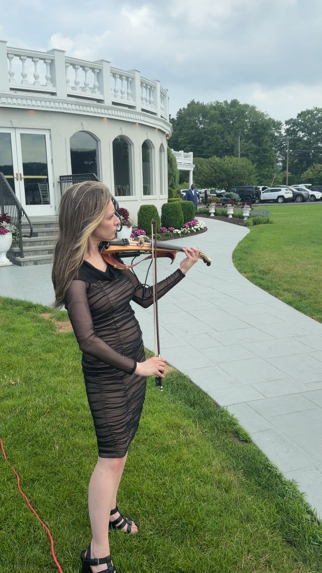 Julie Schatz performing solo violin at a wedding ceremony at Candlewood Inn, Brookfield Connecticut, July 2026