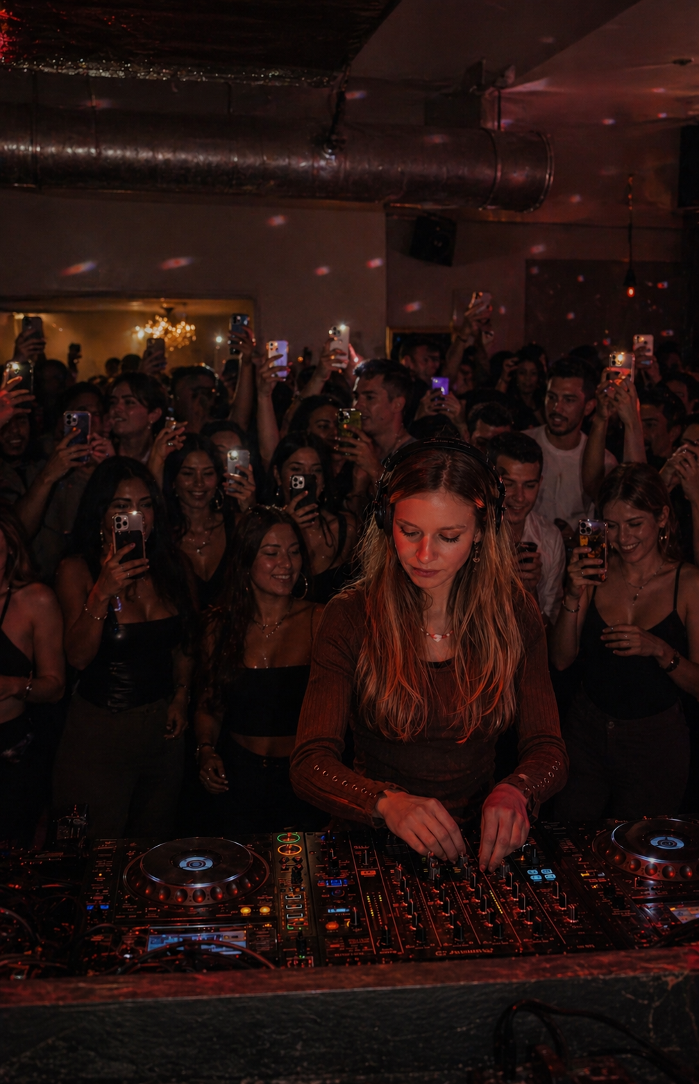 Julie Schatz DJing at a party